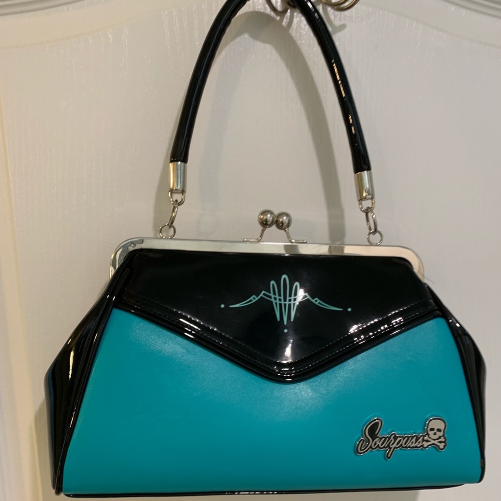 Pinstripe backseat baby sourpuss purse pin up